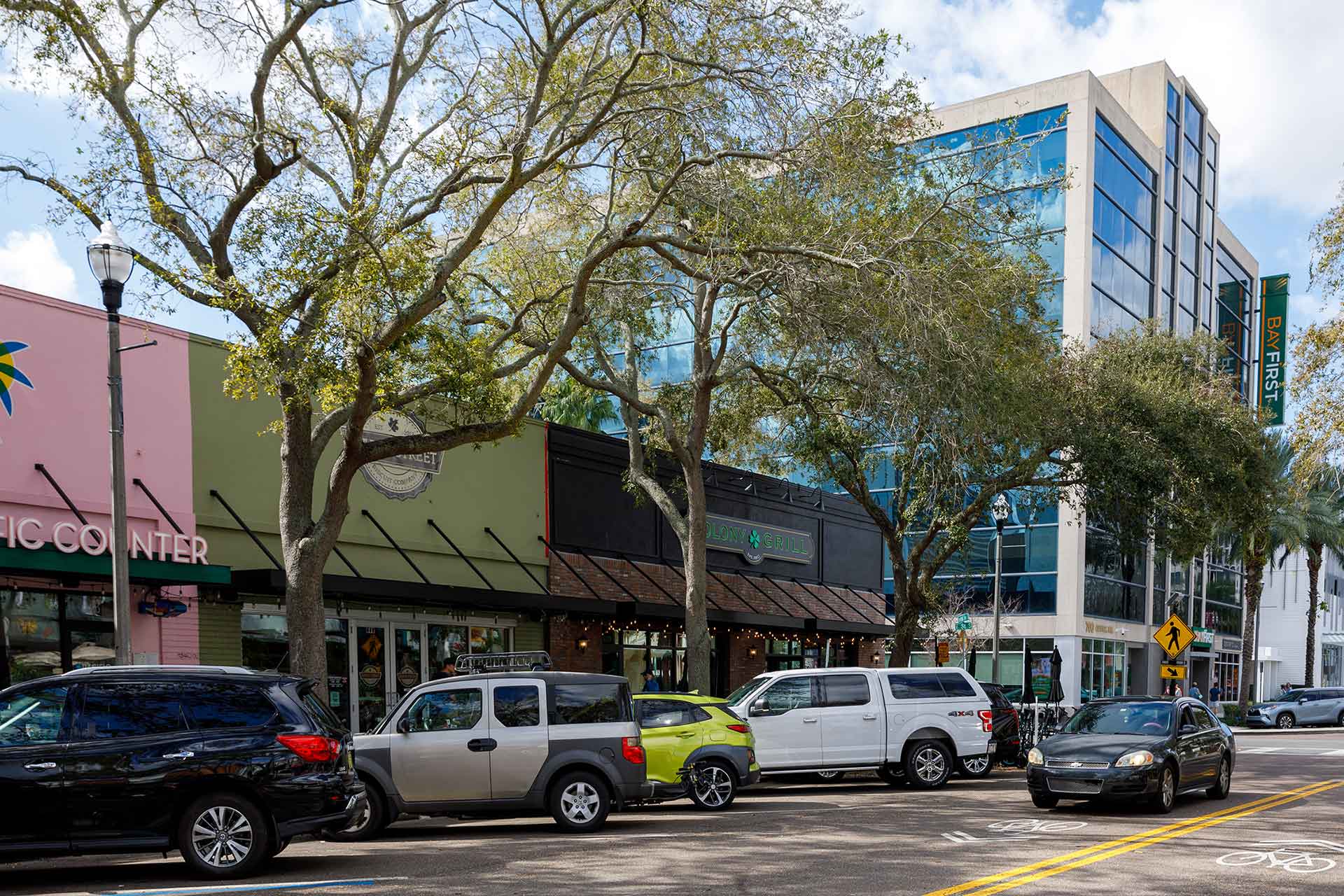 town street with a BayFirst bank in the background